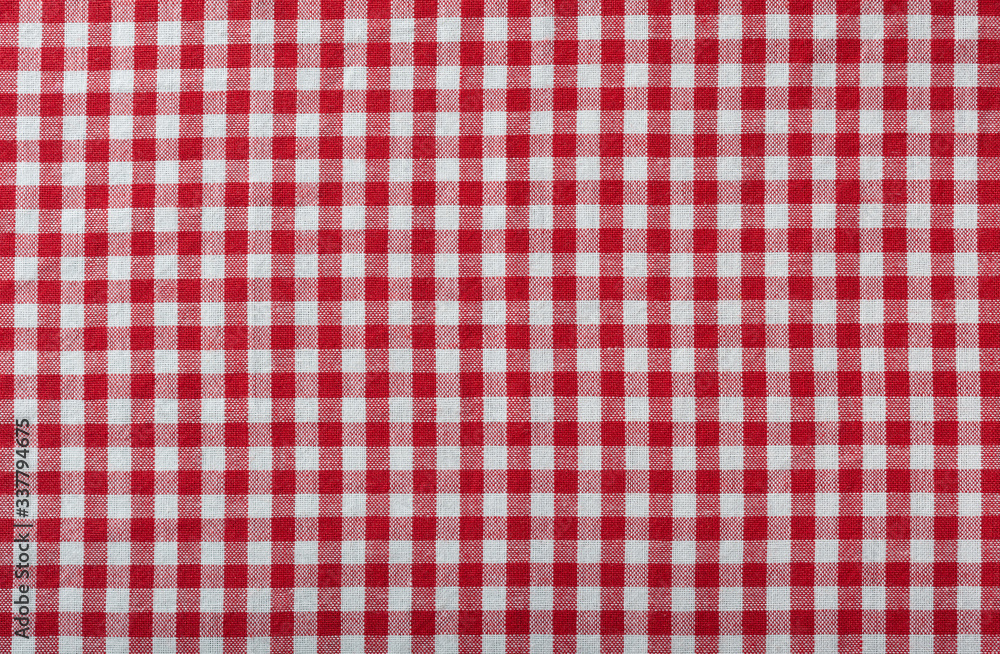 red checkered fabric tablecloth as background red checkered fabric tablecloth as background