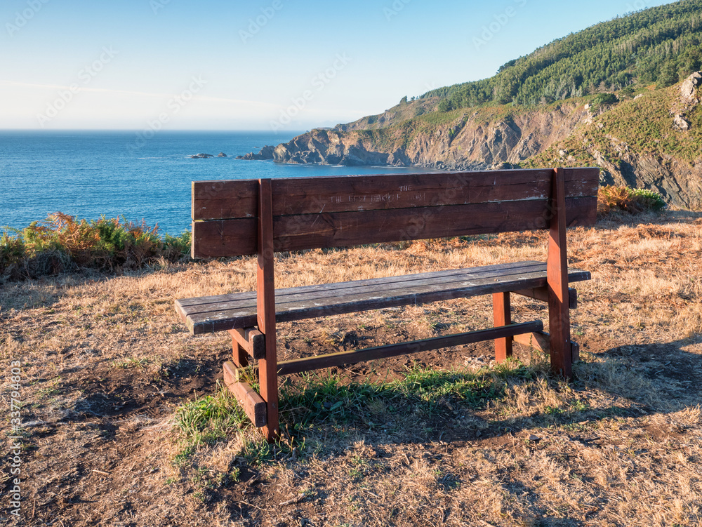 The best bench of the world (Cedeira version) on a high cliff above the ocean at Cedeira, Rias Altas, La Coruna, Galicia, Spain The best bench of the world (Cedeira version) on a high cliff above the ocean at Cedeira, Rias Altas, La Coruna, Galicia, Spain