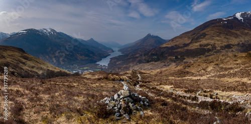 the view over kinlochleven and loch leven in the argyll region of the highlands of scotland during spring shot from the mountains surrounding kinlochleven near the west highland way