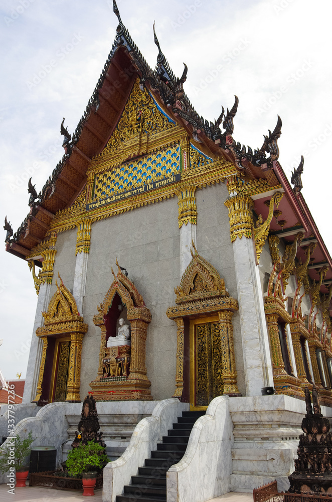 Temple Wat Intharawihan in Bangkok. It was built at beginning of Ayutthaya period, one of the main features is a 32-metre high, 10-metre wide standing Buddha