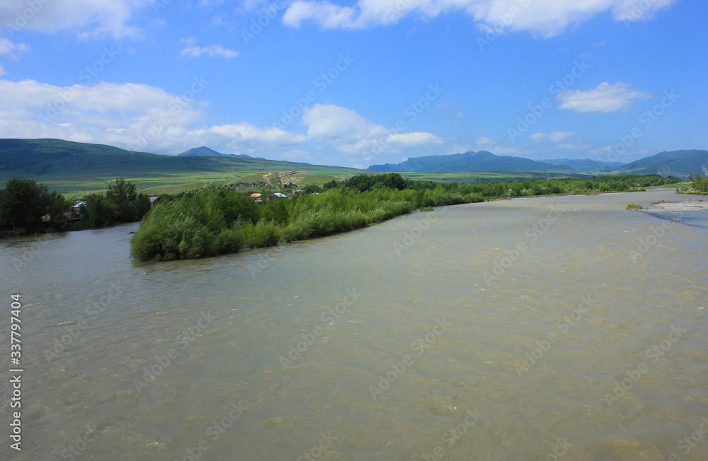 Georgia. Muddy, fast river Kura. Georgia. Muddy, fast river Kura.