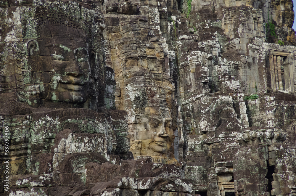 Face stone of ancient Bayon Temple in Angkor Wat, Siem Reap, Cambodia