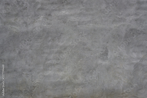 Gray plastered wall. Texture with plaster stains