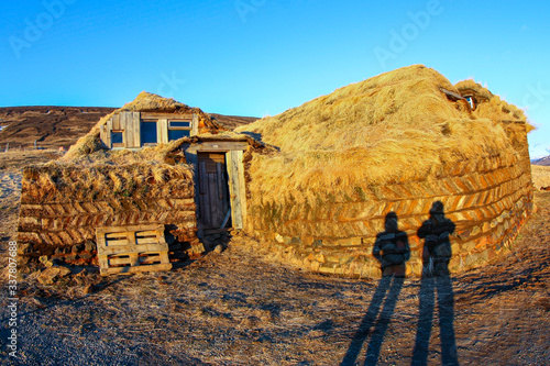 rural houses with a roof made of grass. The Icelandic landscape photo