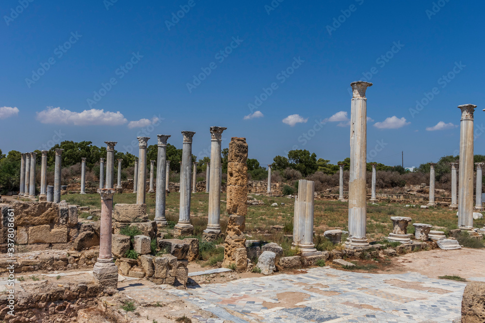 old columns of salamis ruins, ancient city north cyprus and blue sky