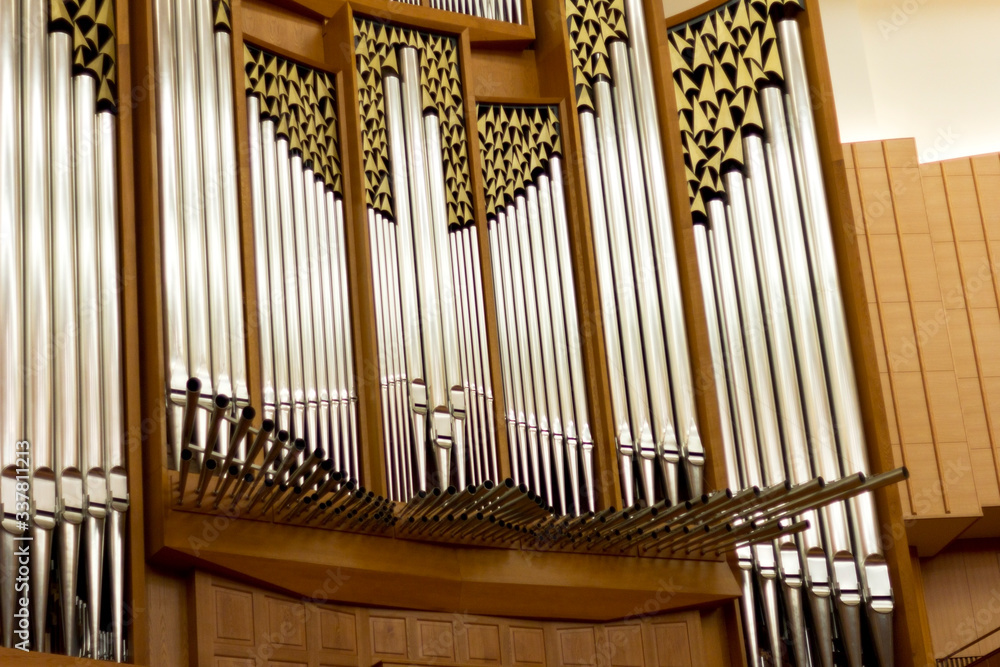 Organ pipes in a large concert hall . Musical instrument. Grand Concert