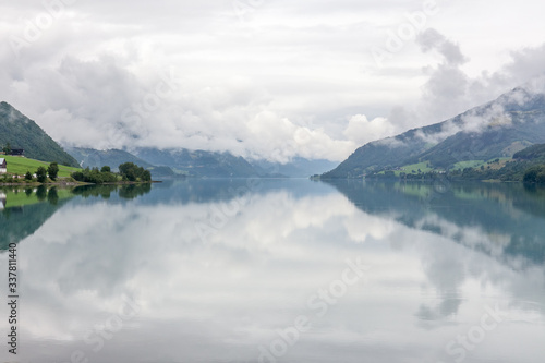 Beautiful Norwegian landscape. view of the fjords. Norway ideal fjord reflection in clear water. selective focus