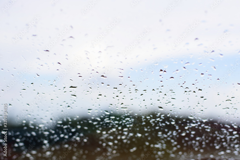 Water drops on glass of the car Water drops on glass of the car