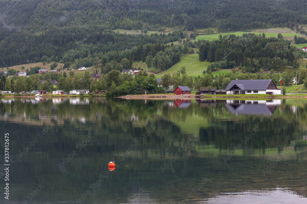 small town in the background. norway, selective focus.
