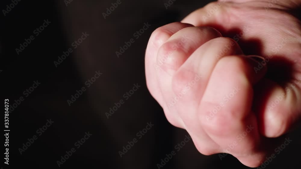 Girl opens fist and shows opened palm with pill Girl opens fist and shows opened palm with pill