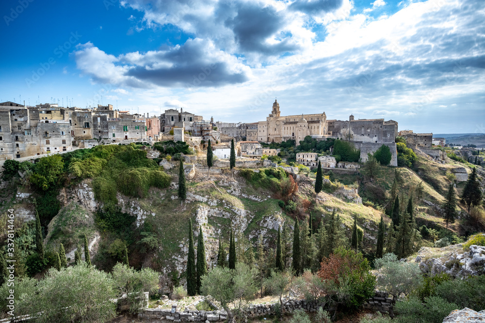 suggestive view of the Gravina and the rock churches (Gravina with the meaning of rock, shaft and erosion of bank river). Gravina in Puglia ancient town, bridge and canyon. Apulia, Italy, Europe