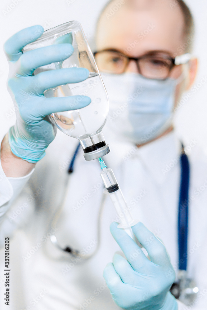 a doctor in a mask, glasses and gloves. stop coronovirus, observe quarantine, self-isolation, does analyzes a doctor in a mask, glasses and gloves. stop coronovirus, observe quarantine, self-isolation, does analyzes
