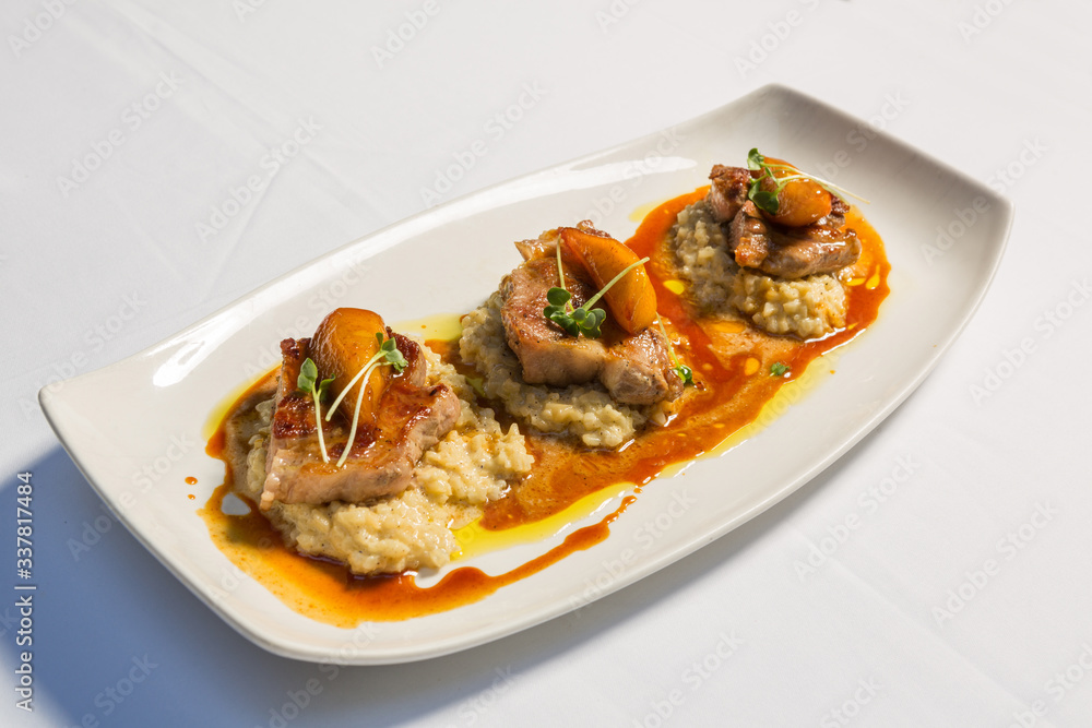 Veal chop without bone served on a plate Veal chop without bone served on a plate