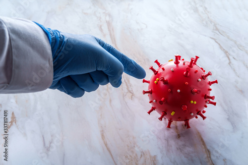 Scientist Pointing Deadly Coronavirus photo