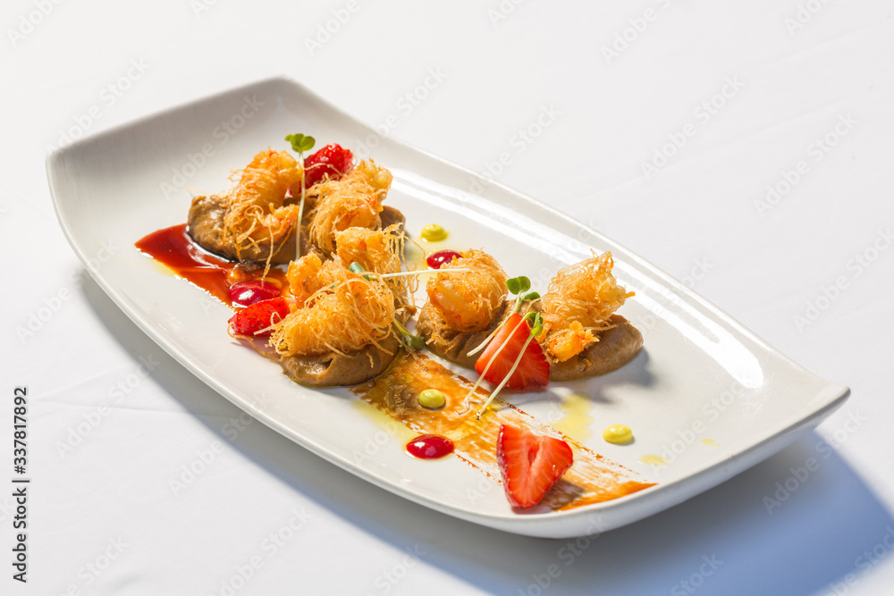 Citrus and almond prawns wrapped in kunafa pastry Citrus and almond prawns wrapped in kunafa pastry