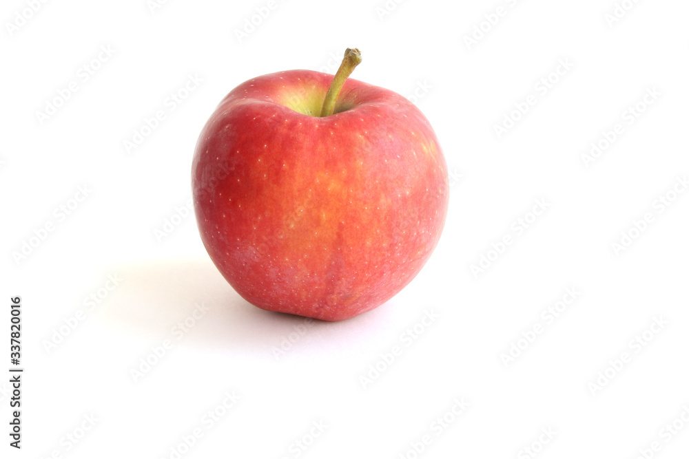 Beautiful fresh red gala apple with stem on the top isolated on white background. Cooking Ingredients Theme. Beautiful fresh red gala apple with stem on the top isolated on white background. Cooking Ingredients Theme.