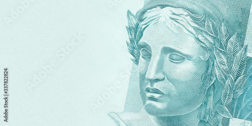 Brazilian Real - BRL currency. One hundred reais face template for economic and financial concepts. photo