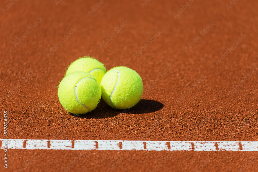 Tennis balls on a tennis court.Shallow doff