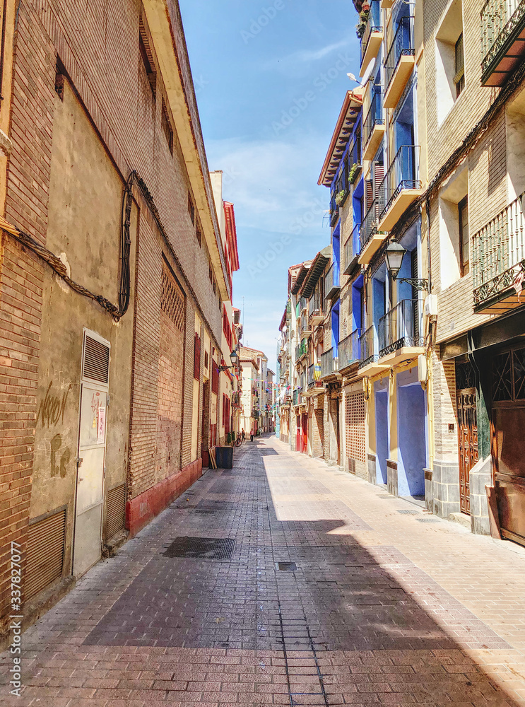 A street of Zaragoza in Spain, in a sunny day with blue sky