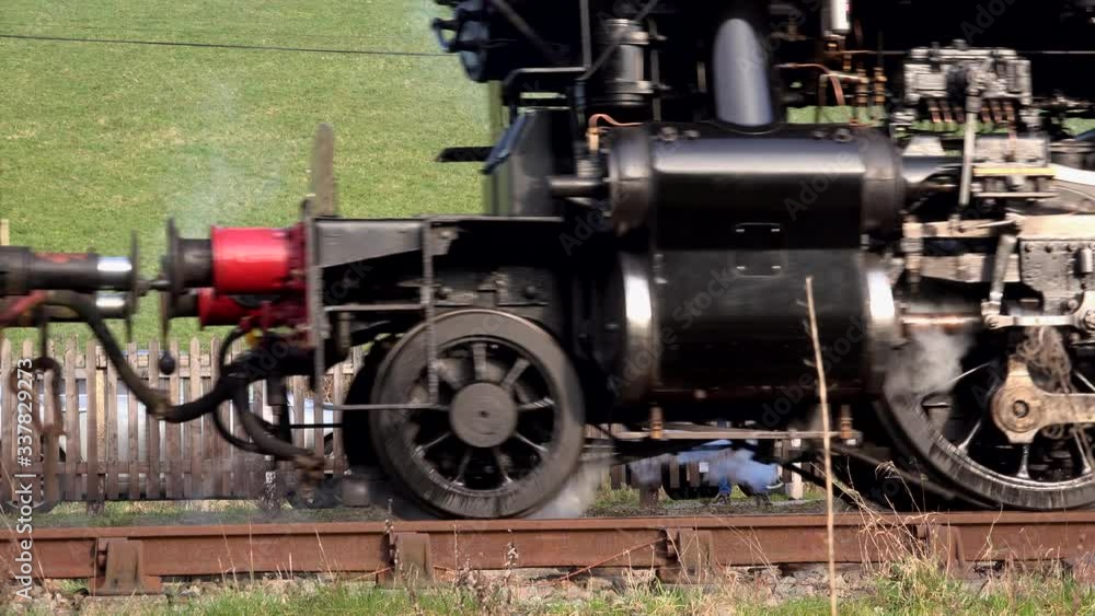 Steam train close up of wheels moving on track UK 4K Steam train close up of wheels moving on track UK 4K