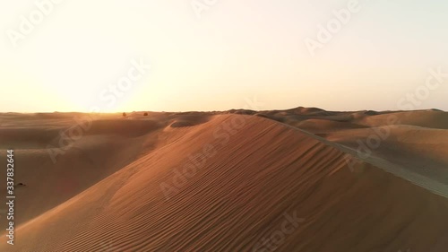 Close-up dune aerial view. Sunset desert in Emirates. Endless desert dunes. Expo2020 content