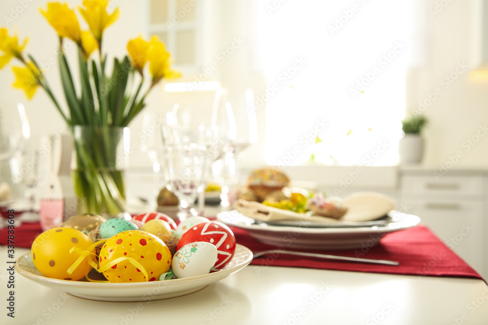 Festive Easter table setting with decorated eggs, closeup Festive Easter table setting with decorated eggs, closeup