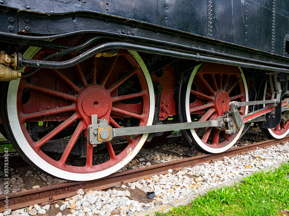 Old locomotive wheels detail close-up