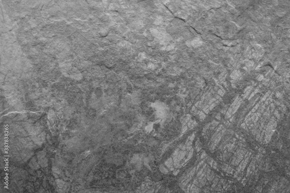 Fototapeta premium Texture of grey plastic with imitation of stone.