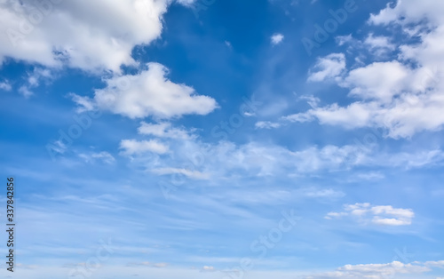 Light white clouds in the blue sky.