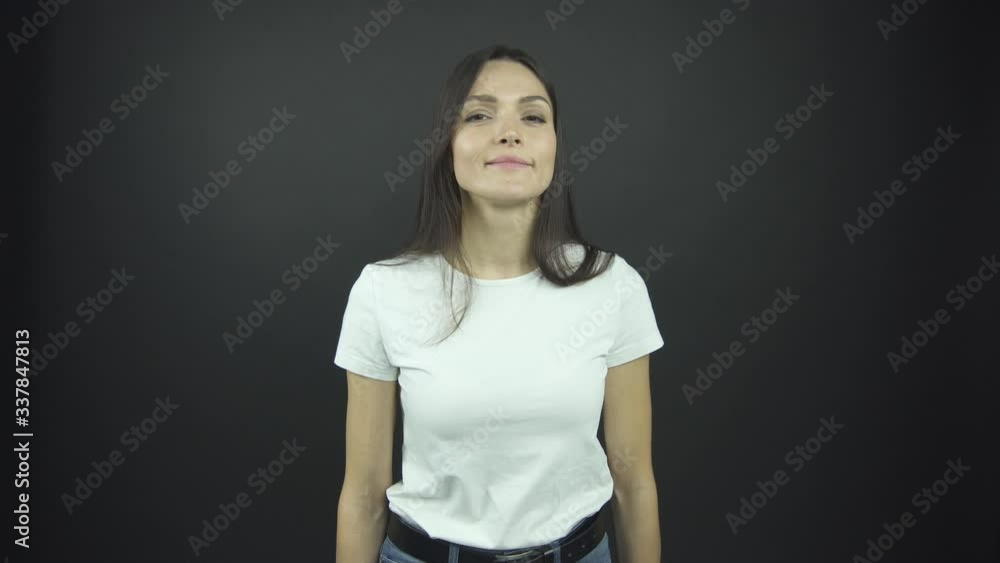 confident lady with long loose hair performs deep breath confident lady with long loose hair performs deep breath