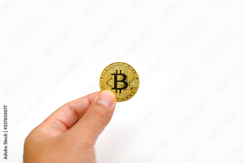 man hand holding physical a bitcoin btc coin man hand holding physical a bitcoin btc coin