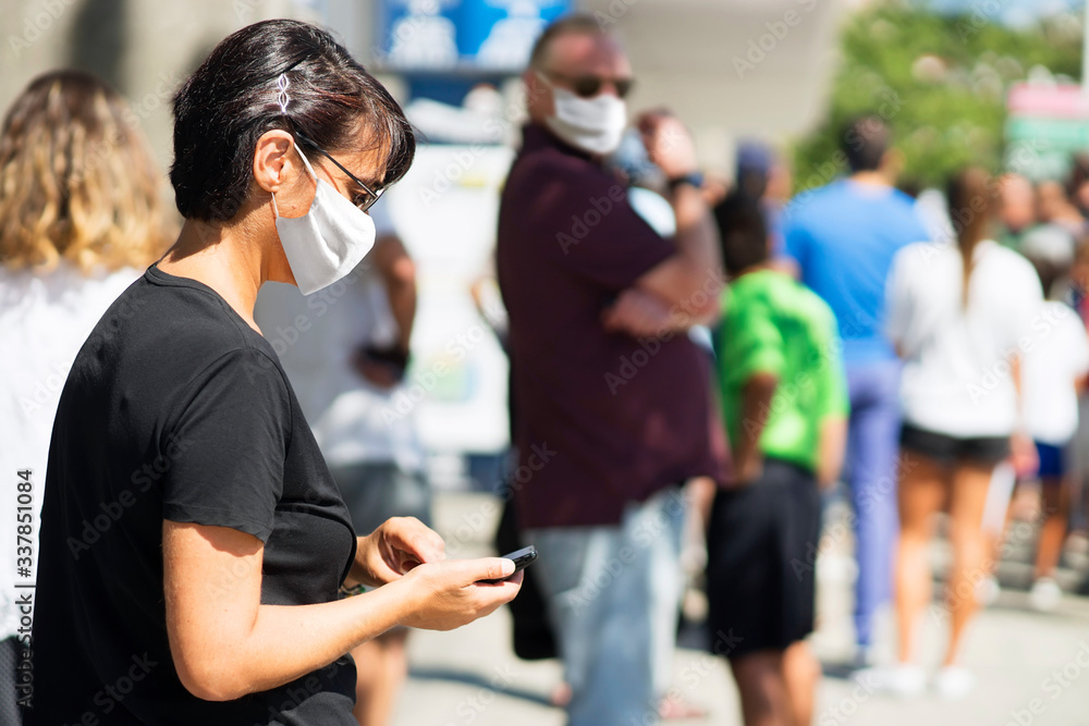 people queue with mask for coronavirus in line up , draggle people queue with mask for coronavirus in line up , draggle