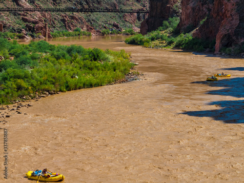River Rafts Riding the Colorado River Near The Black Bridge , Grand Canyon National Park, Arizona, USA