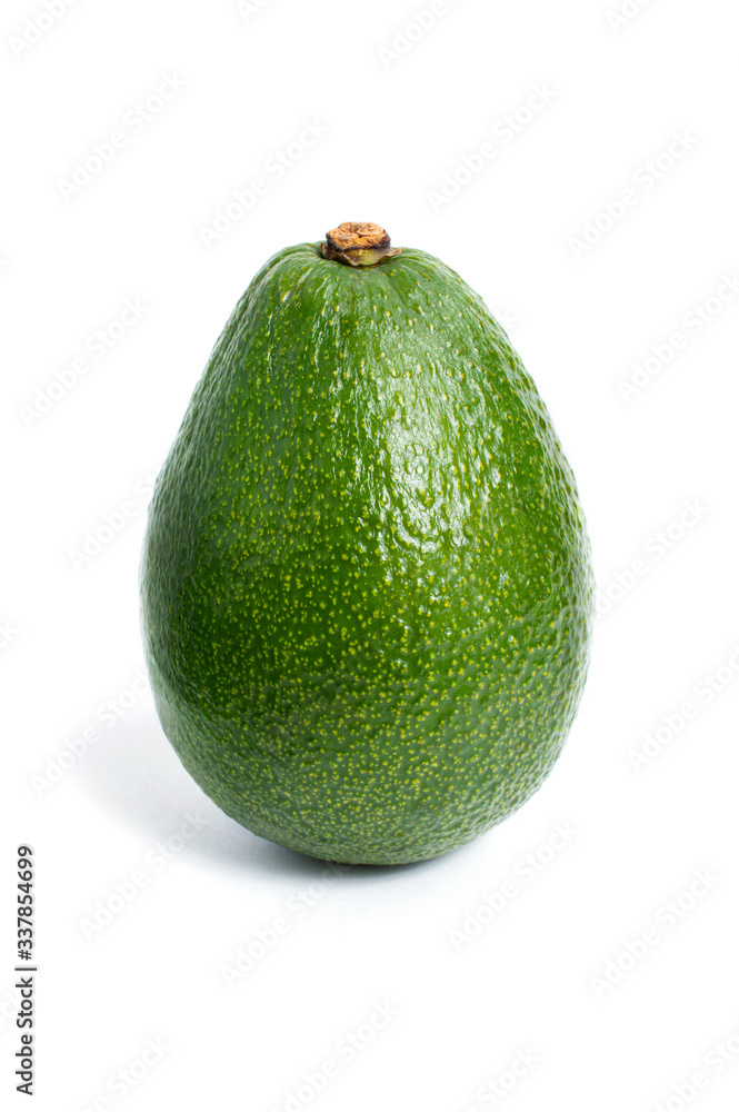 Green avocado closeup on a white background Green avocado closeup on a white background