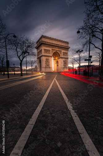 World famous Arc de Triomphe at the city center of Paris, France. 