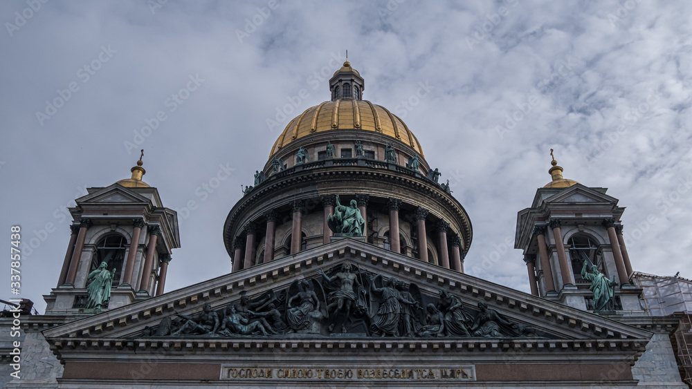 The dome of St. Isaac's Cathedral with the inscription in the frieze on the portico 