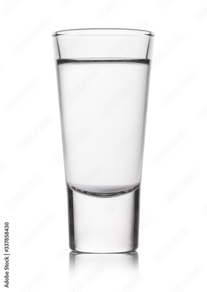 Glass shot of russian pure vodka on white background Glass shot of russian pure vodka on white background