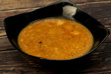 Chickpea soup on wooden background