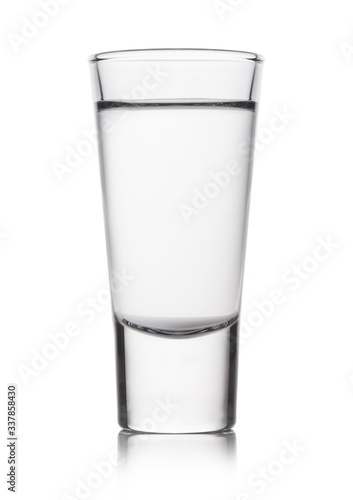 Glass shot of russian pure vodka on white background