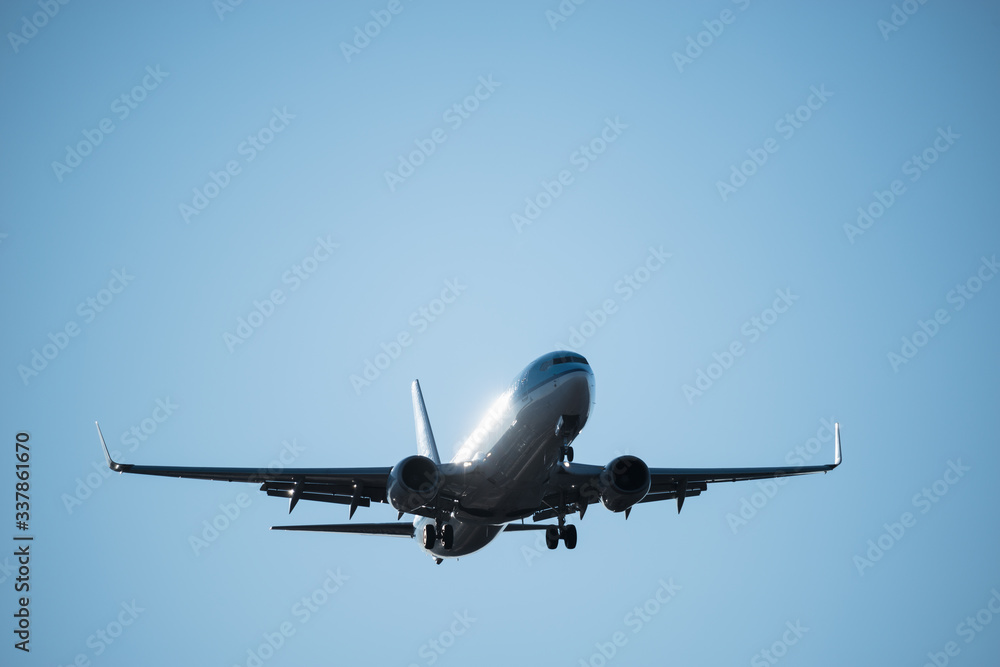 Passenger plane is ready for landing in the airport.