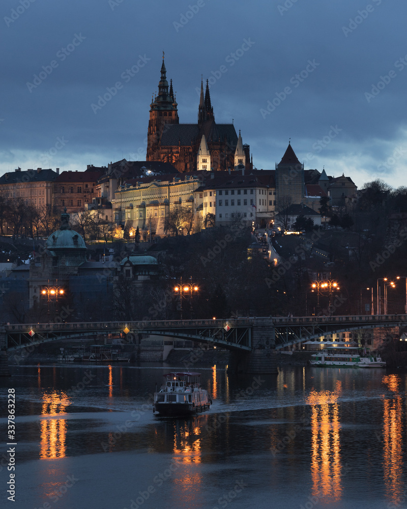 Prague Castle and a boat at Vltava River, Czech Republic