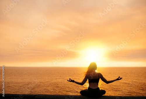 yoga meditation sunset nature girl woman calm asana sea © Kateryna