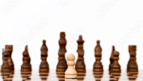 Team. White Chess Pawns on chess board in black and white. Leader.