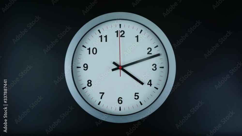 Gray wall clock Showtime 04.00 am or pm. on black background, Time lapse 60 minutes moving fast, Time concept. Gray wall clock Showtime 04.00 am or pm. on black background, Time lapse 60 minutes moving fast, Time concept.