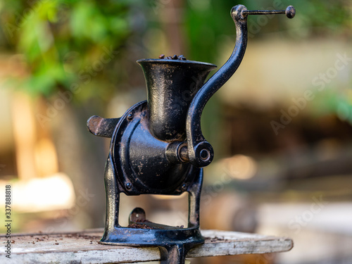 Ground coffee in the manual grinder