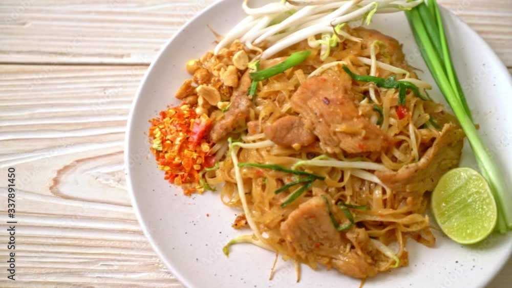 stir-fried rice noodles with pork in Asian style stir-fried rice noodles with pork in Asian style