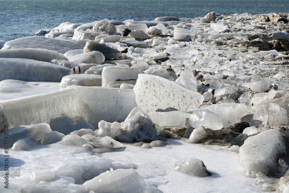 Natural background with ice floes on the beach Natural background with ice floes on the beach