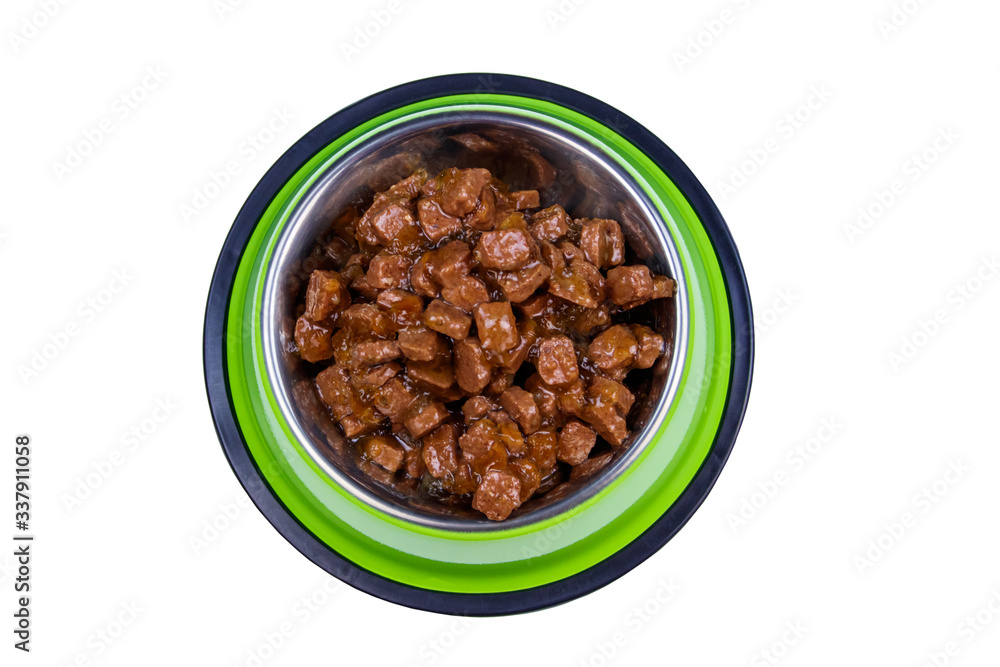 Canned food for cats or dogs in metal green bowl isolated on white background Canned food for cats or dogs in metal green bowl isolated on white background