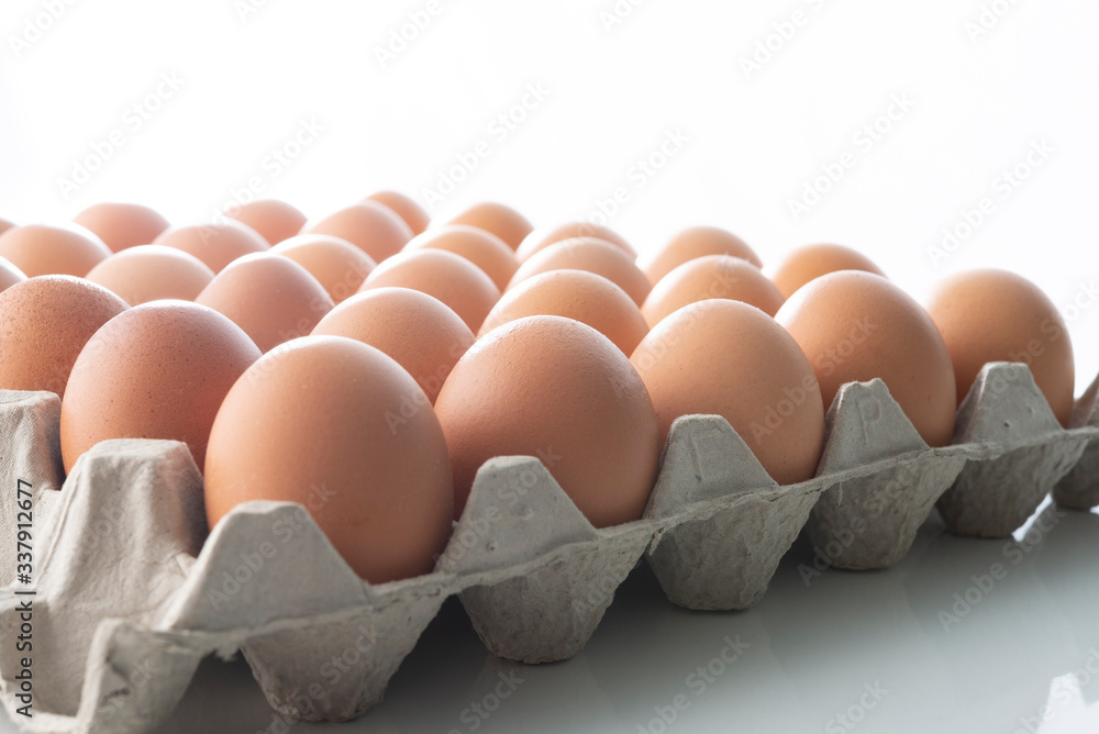 Chicken eggs in carton box with copy space Chicken eggs in carton box with copy space