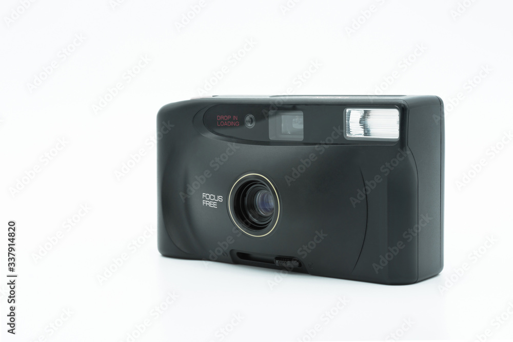 Retro film camera isolated on the white background